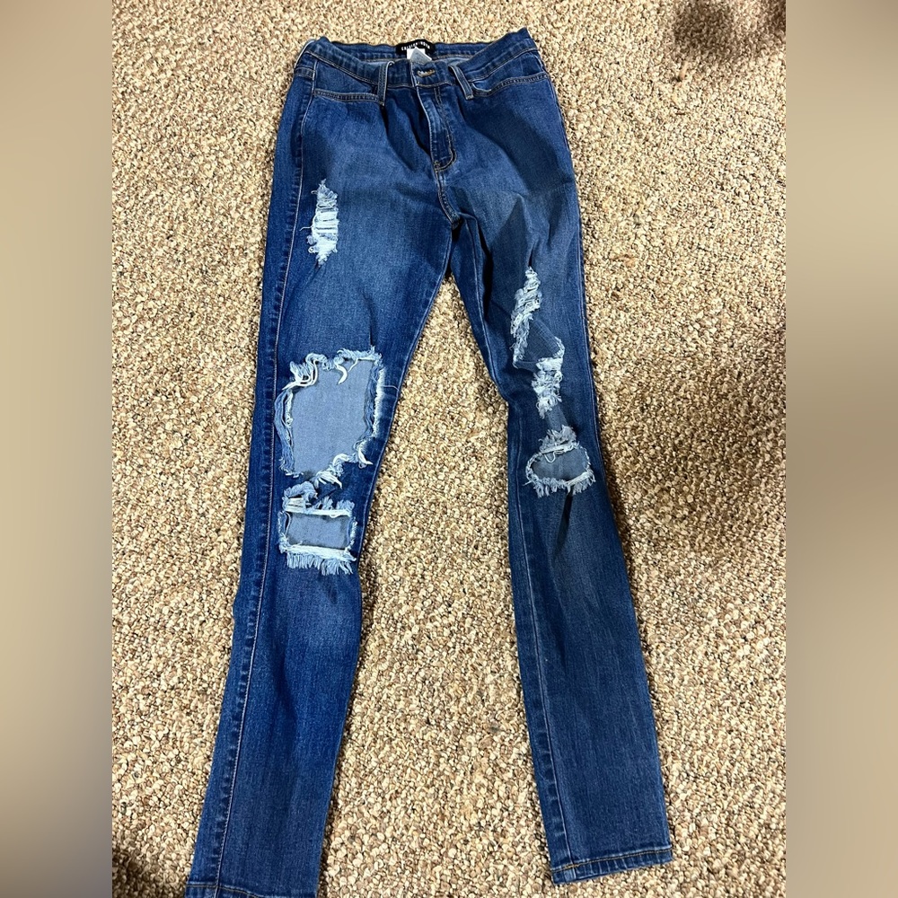 Distressed Blue Jeans